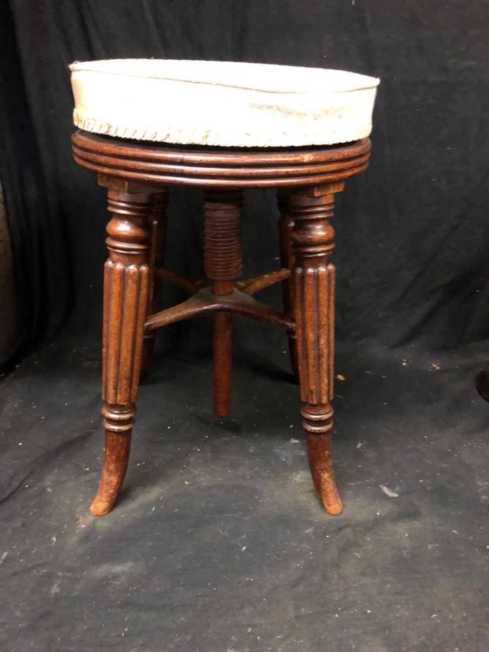 A regency revolving piano stool View II