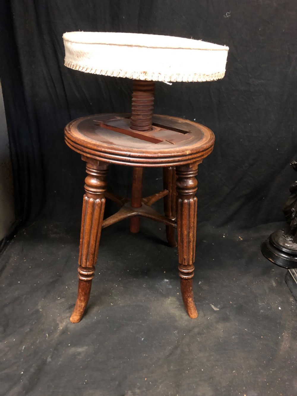 A regency revolving piano stool View III