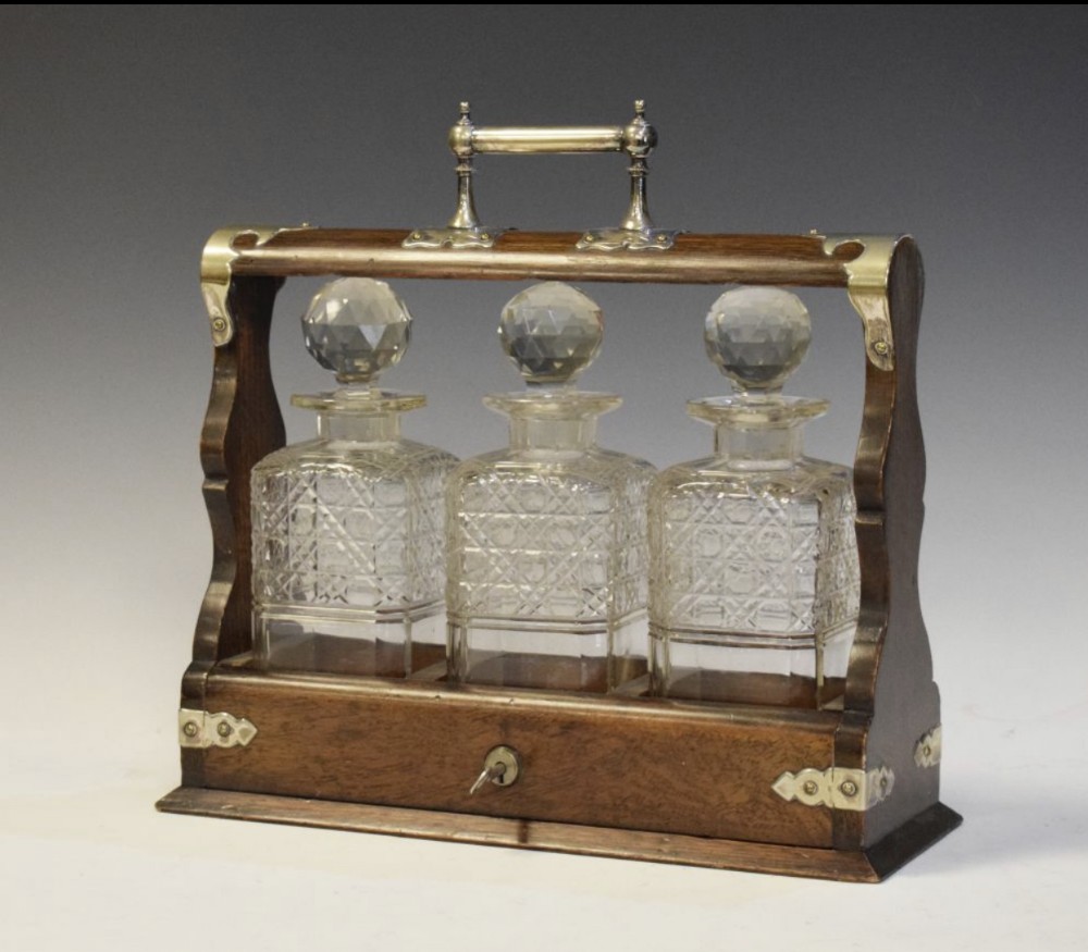 C19th oak and silver plate mounted three bottle tantalus