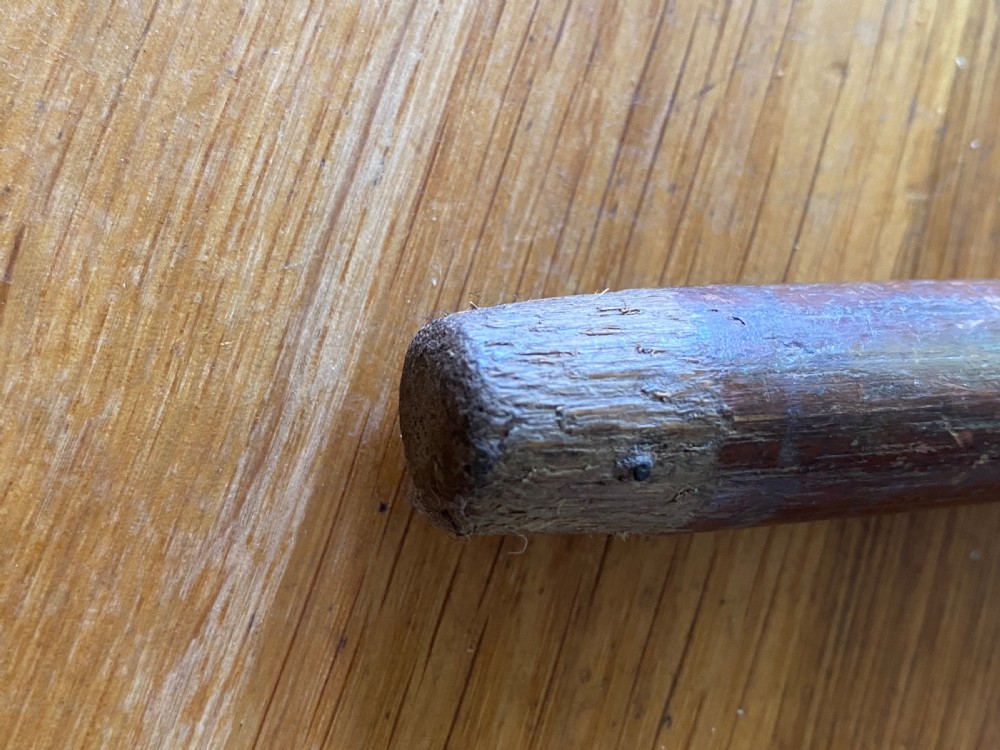 A bulbous white metal topped cane monogrammed RM or MR View V