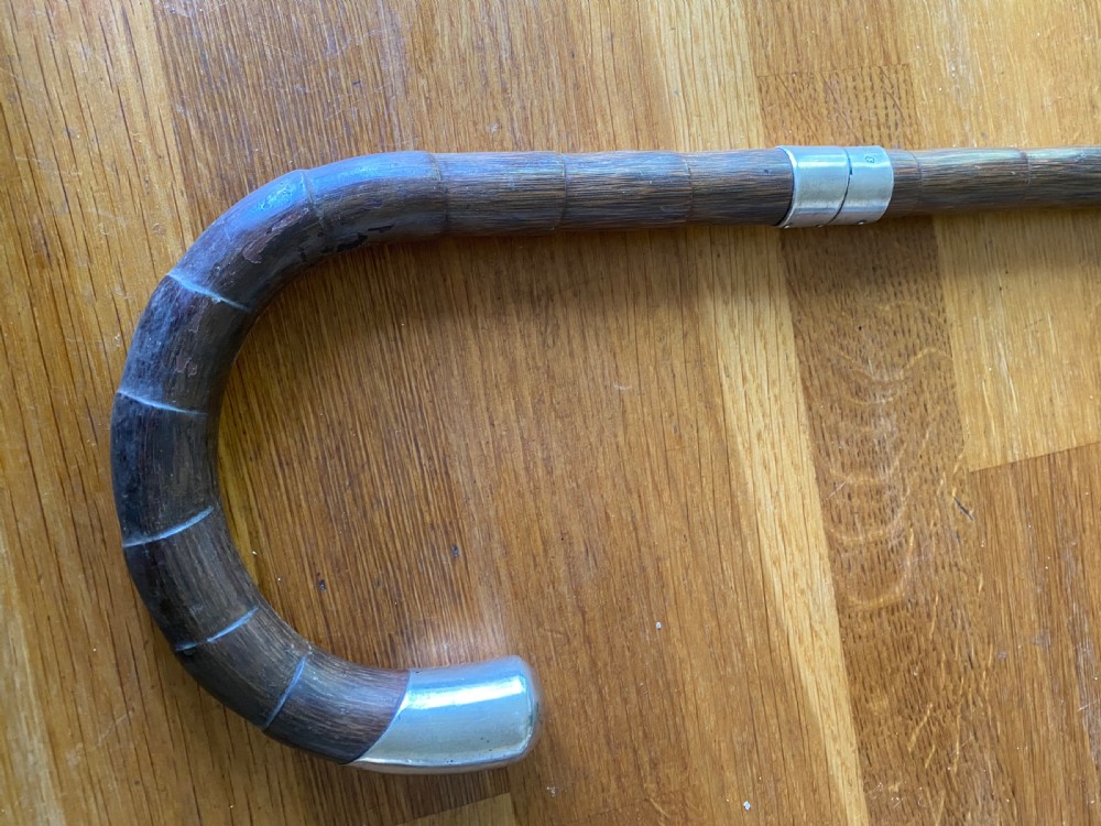Silver topped palm wood walking stick  View II