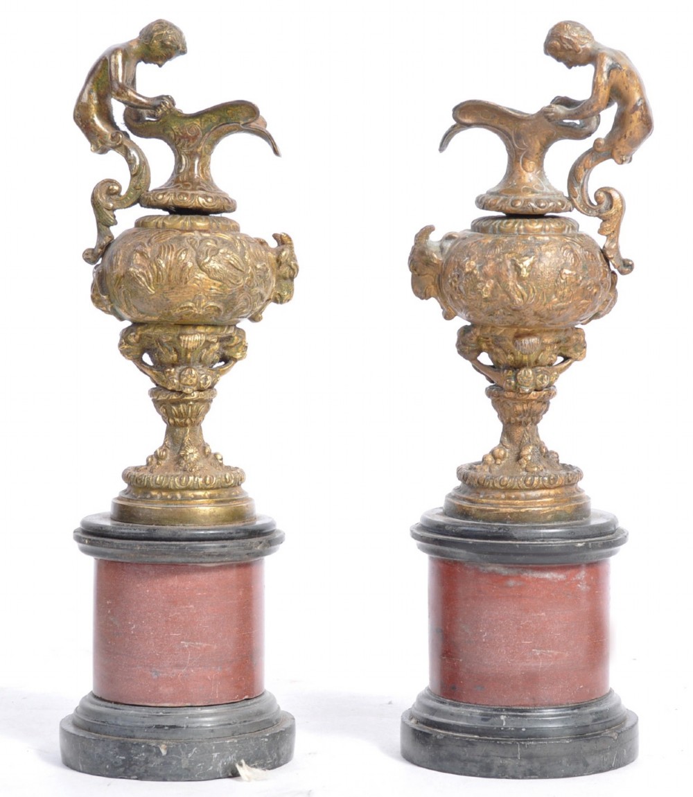 A pair of C19th French antique classical bronze and gilded urns 