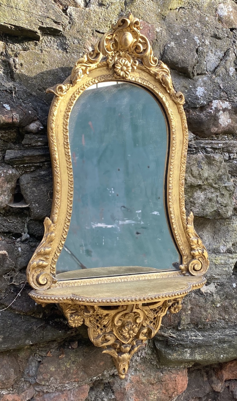 Small gilded wall bracket mirror 