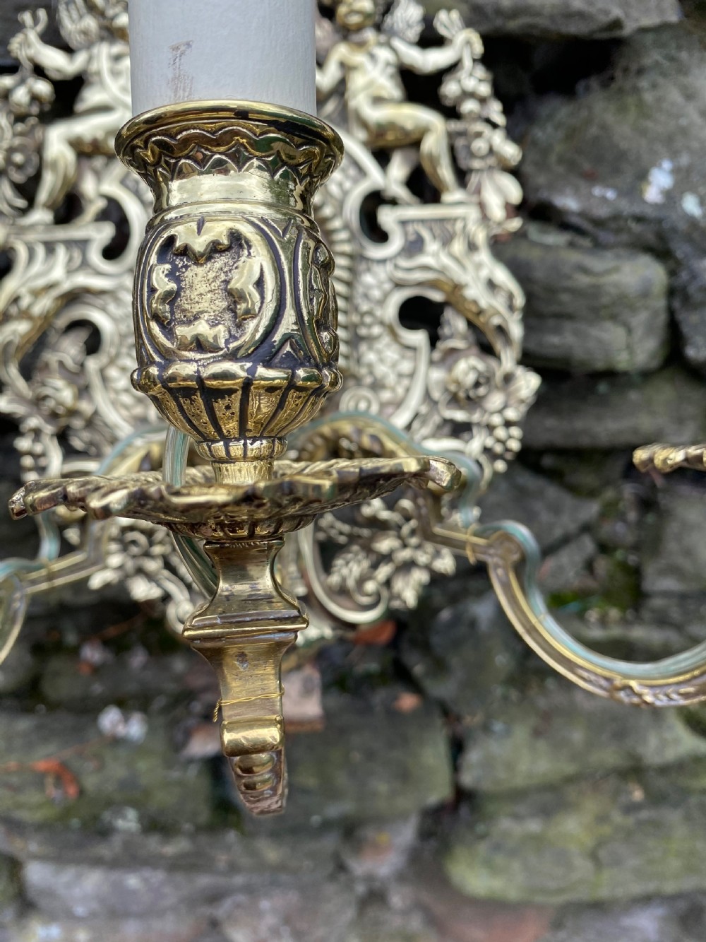 A three armed brass wall light  View IV