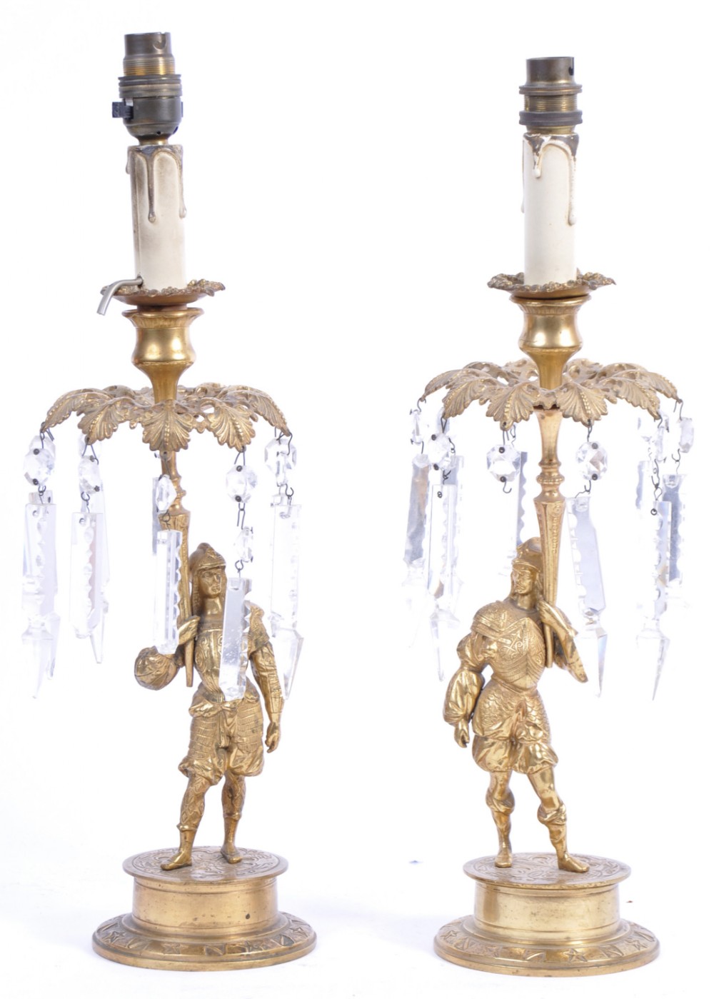 A pair of regency candlesticks in gilt bronze and converted to electricity