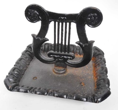 C19th cast iron lyre shaped boot scraper 
