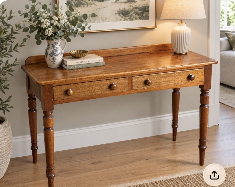 A Victorian warm brown mahogany writing desk featuring two frieze drawers with turned wooden knobs, supported by turned tapered legs and a low gallery backboard. View VII