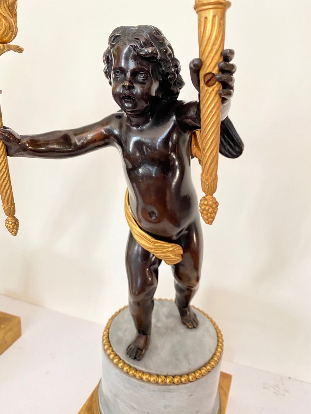 Pair of French Bronze and Gilt Bronze Putti Candelabra. Circa 1900 View II