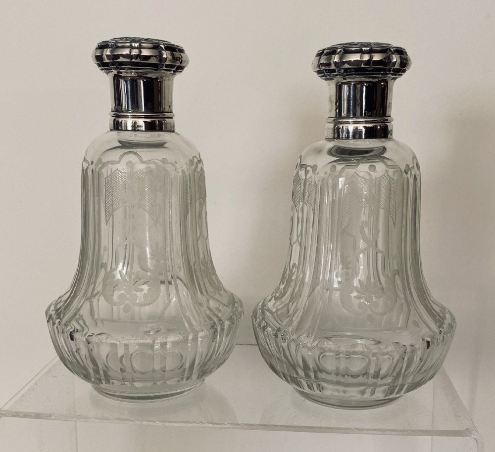 Pair of French etched & silver capped Scent bottles. Circa 1900