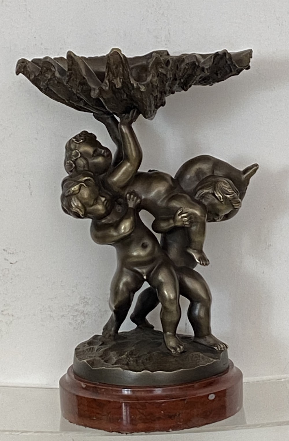 Bronze Cherubs holding Shell. Circa 1900