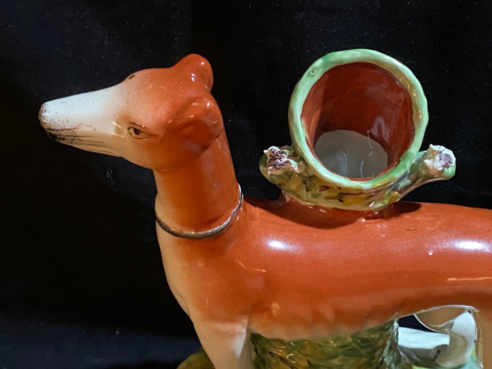 A Pair of Staffordshire Pottery Models of Greyhounds. View III