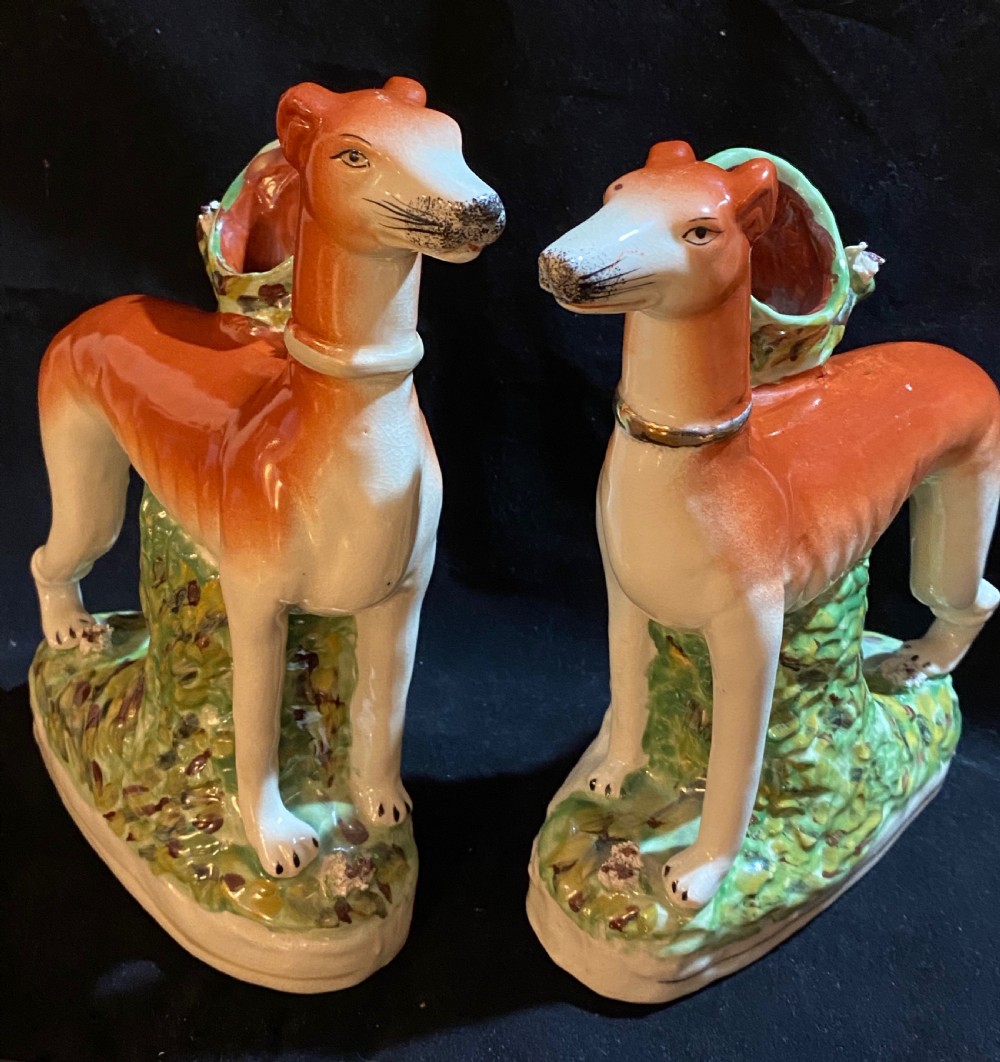 A Pair of Staffordshire Pottery Models of Greyhounds. View VI