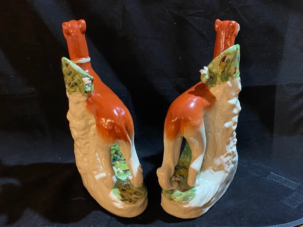 A Pair of Staffordshire Pottery Models of Greyhounds. View VII