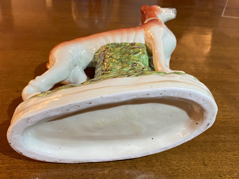 A Pair of Staffordshire Pottery Models of Greyhounds. View VIII