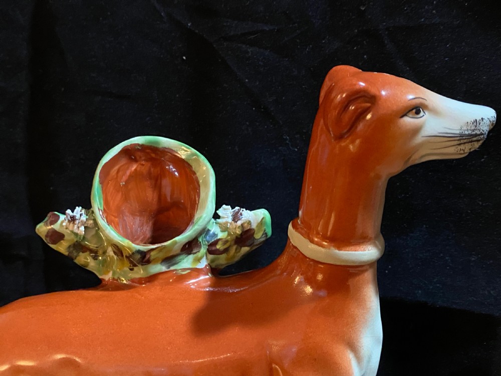 A Pair of Staffordshire Pottery Models of Greyhounds. View X