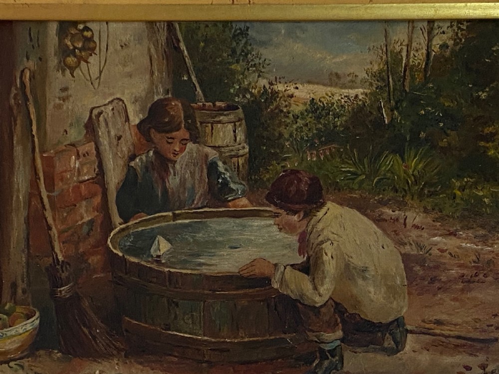 An 1884 Victorian oil painting on canvas by Albert-Ernest Brockbank depicting children playing with a toy boat in a water tub inside a broad gold gilt frame. View III