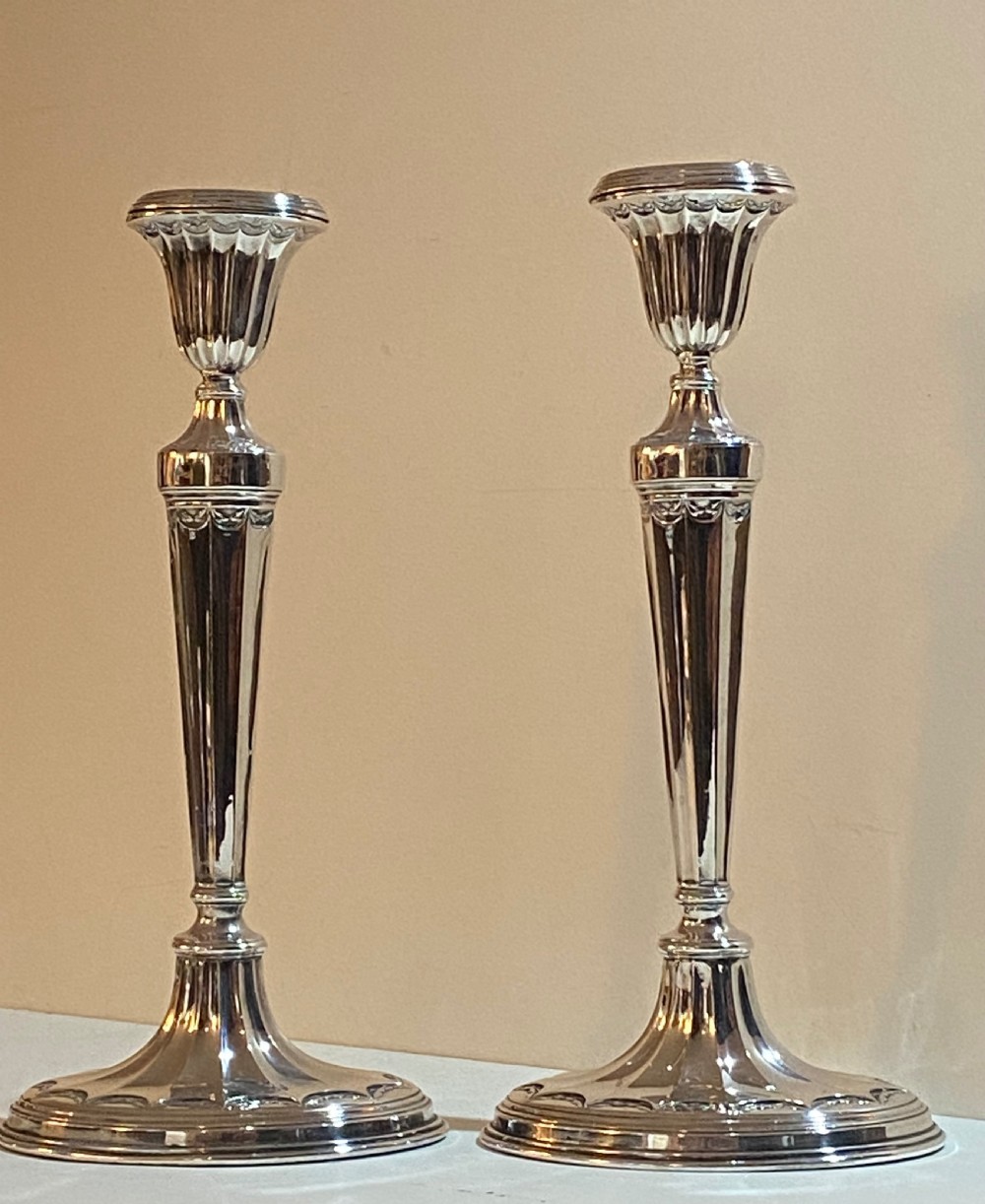 Pair of Silver Plated Candlesticks, 19th Century.
 View II