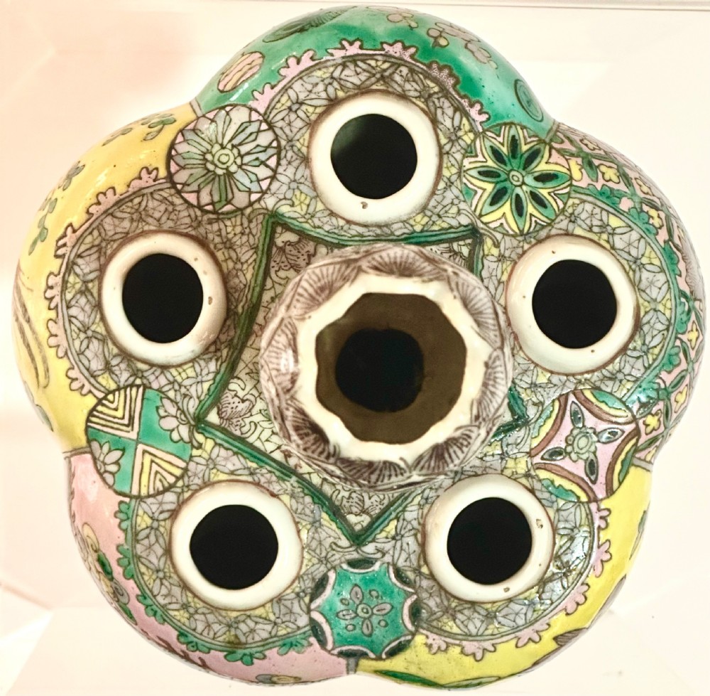 A Chinese polychrome porcelain tulip vase featuring multiple stem apertures, a central neck topped with a lotus bud, and hand-painted panels depicting birds and floral motifs. View II