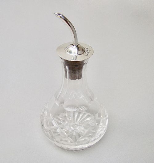 Mid-century Silver Mounted Angostura Bitters Bottle by the Adie Brothers, Birmingham 1952