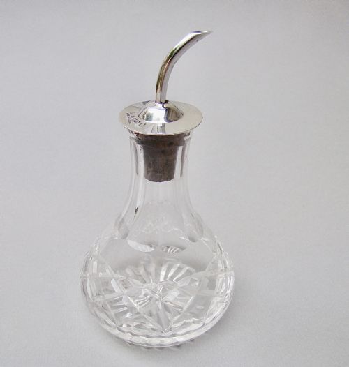 fig 1. MID-CENTURY SILVER MOUNTED ANGOSTURA BITTERS BOTTLE BY THE ADIE BROTHERS, BIRMINGHAM 1952