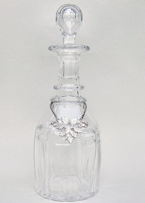 fig 1. EXQUISITE VICTORIAN CUT GLASS DECANTER WITH A RARE SILVER WINE LABEL FOR SAUTERNE, LONDON 1839