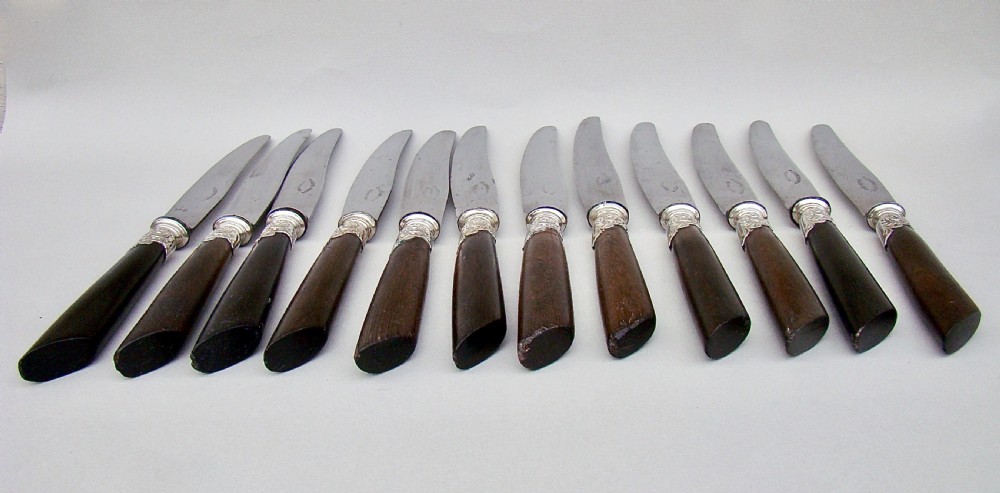 SET OF TWELVE 19TH C. FRENCH TABLE KNIVES WITH EBONY HANDLES, SILVER PLATED FERRULES AND STEEL BLADES, CIRCA 1890
 View IV