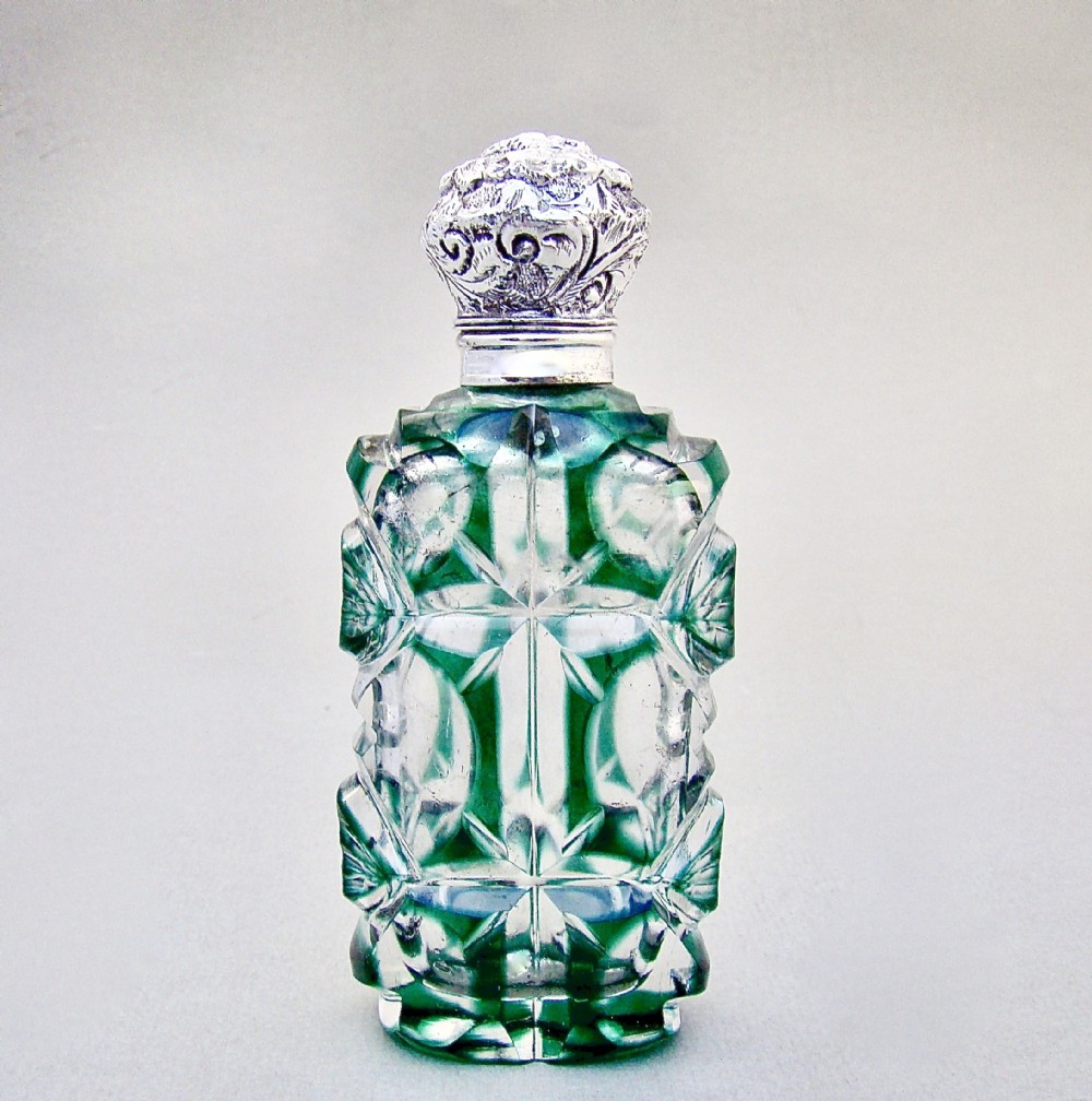 LARGE VICTORIAN SILVER AND BRISTOL GREEN OVERLAY BOHEMIAN GLASS SCENT BOTTLE , CIRCA 1890
