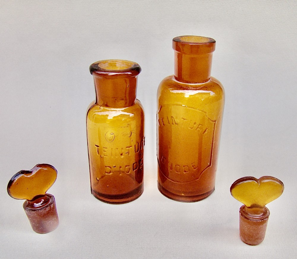 CHARMING PAIR OF SMALL 19TH CENTURY FRENCH AMBER GLASS APOTHECARY BOTTLES View IV