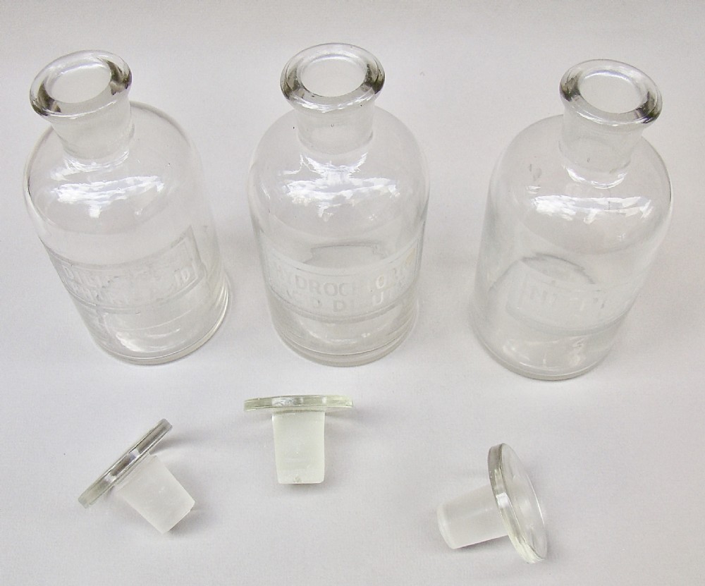 UNUSUAL SET OF THREE EARLY 20TH CENTURY ETCHED GLASS CHEMISTRY BOTTLES, CIRCA 1920
 View IV