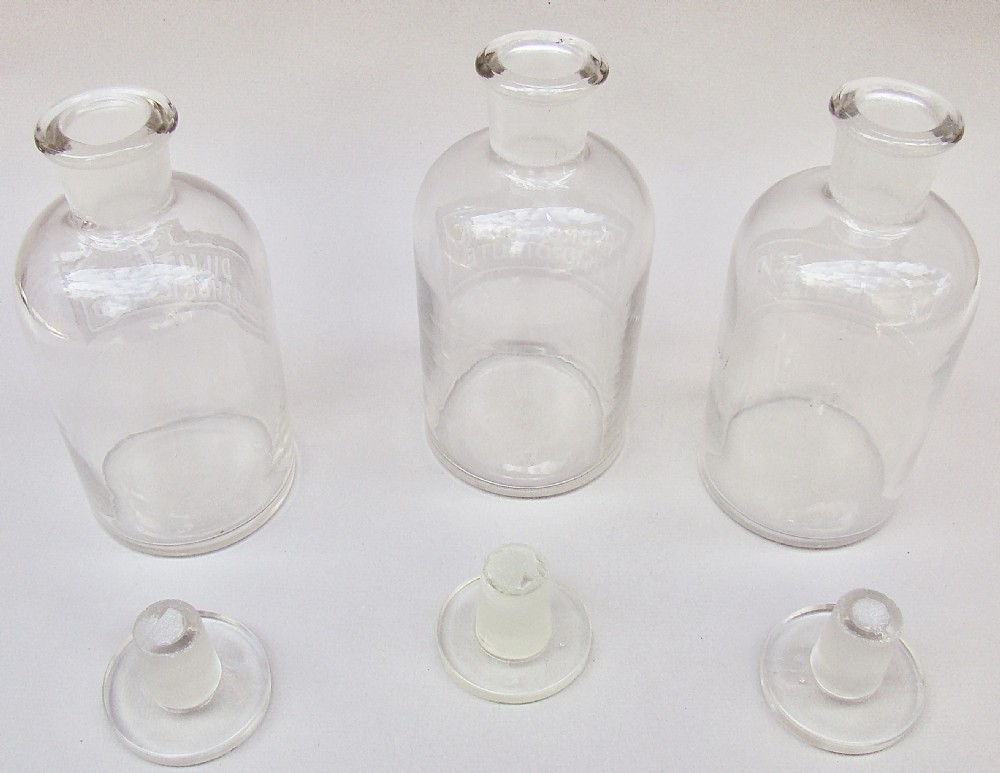 UNUSUAL SET OF THREE EARLY 20TH CENTURY ETCHED GLASS CHEMISTRY BOTTLES, CIRCA 1920
 View VI