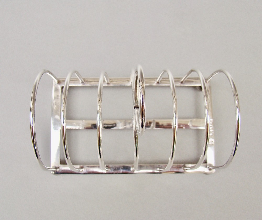 GOOD EDWARDIAN SOLID SILVER TOAST RACK BY WILLIAM HUTTON & SONS, LONDON 1901 View V