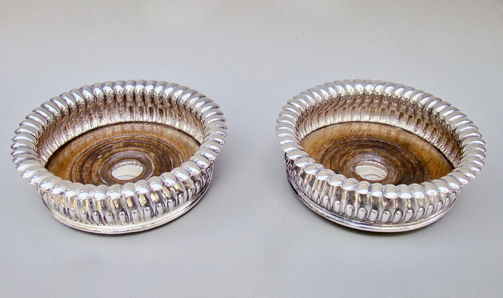UNUSUAL PAIR OF GEORGIAN OLD SHEFFIELD PLATE WINE COASTERS, CIRCA 1800