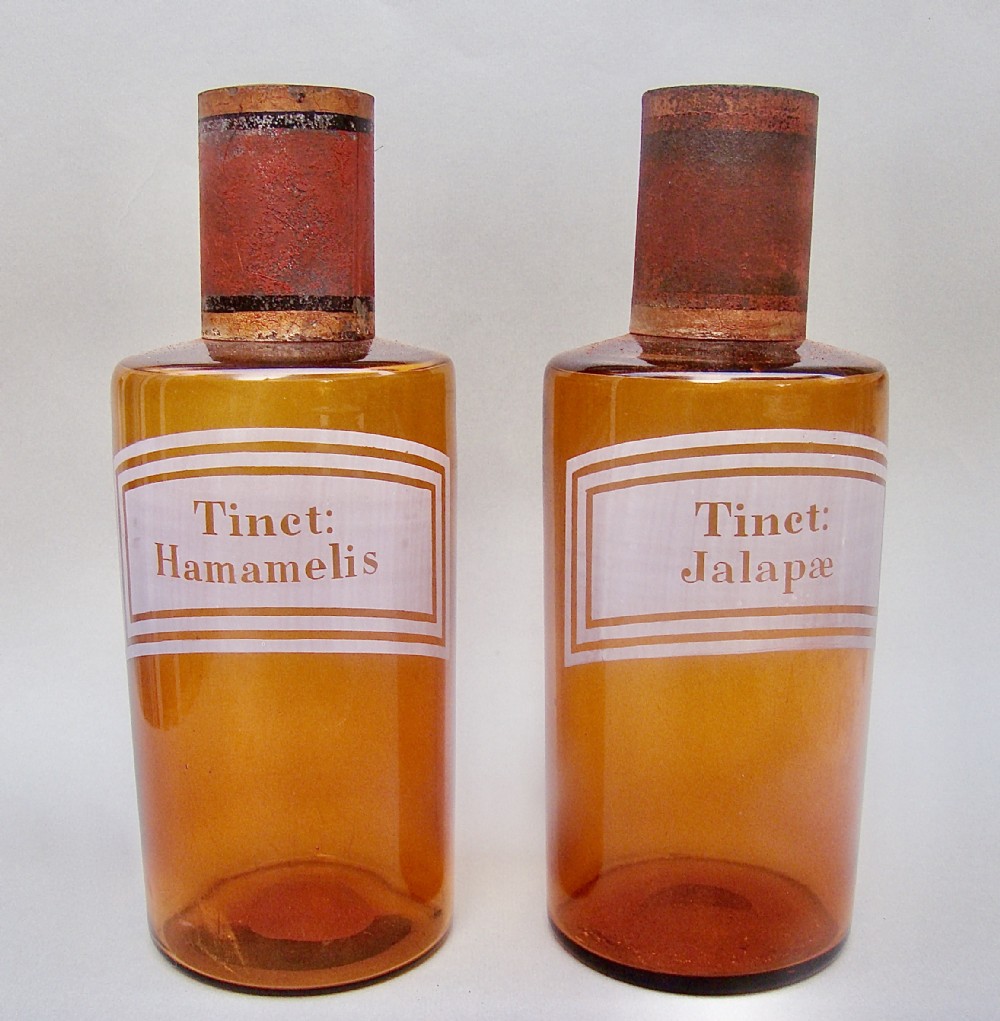 RARE PAIR OF 19TH CENTURY FRENCH ETCHED AMBER GLASS APOTHECARY JARS, CIRCA 1890