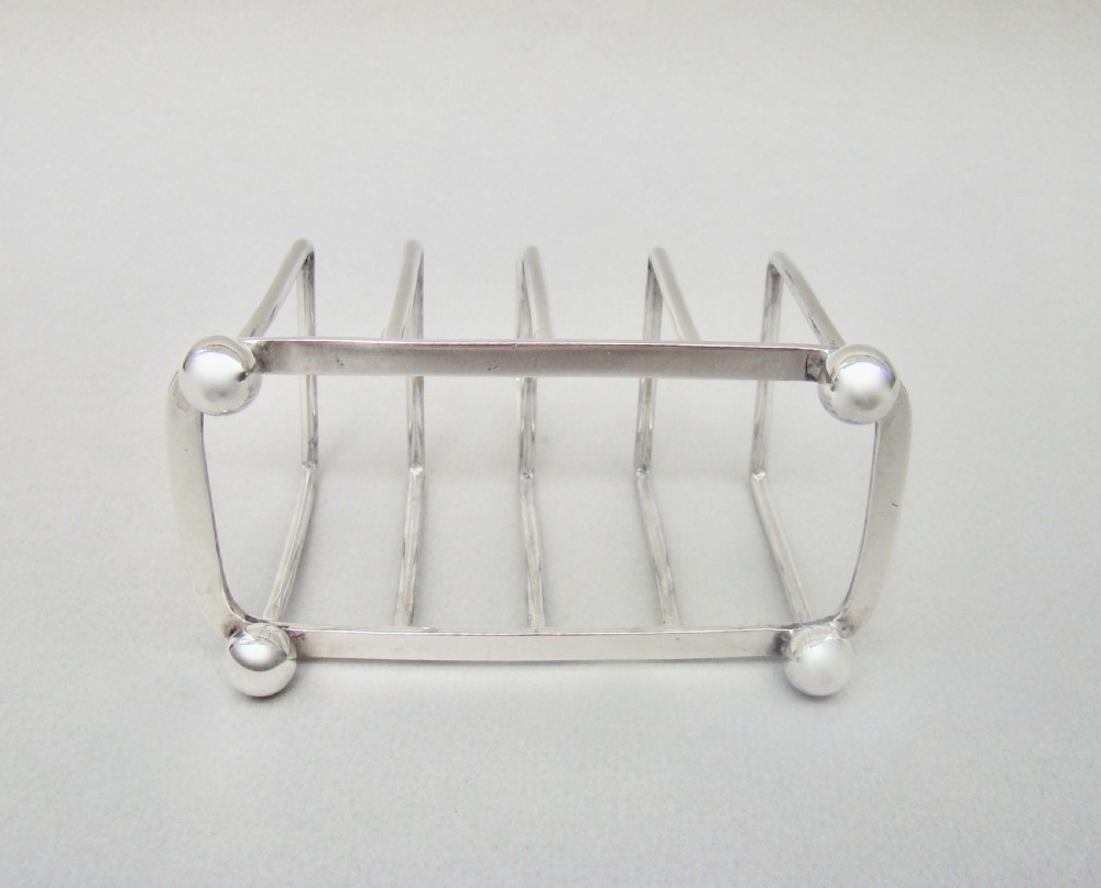 ELEGANT EDWARDIAN SILVER TOAST RACK BY THE C.E. NIXON, SHEFFIELD 1907 View VI