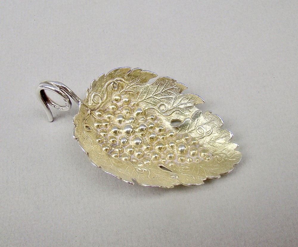 FABULOUS GEORGIAN SILVER-GILT VINE LEAF CADDY SPOON BY JOSEPH WILLMORE, BIRMINGHAM 1808