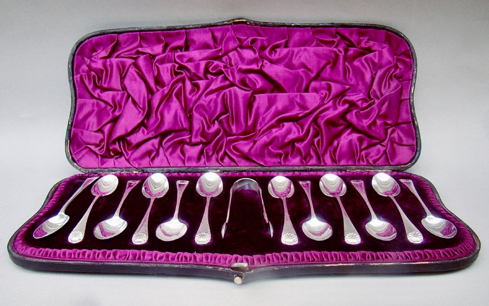 CASED SET OF 12 VICTORIAN TEASPOONS & MATCHING SUGAR TONGS BY WAKELY & WHEELER, LONDON 1889 View II