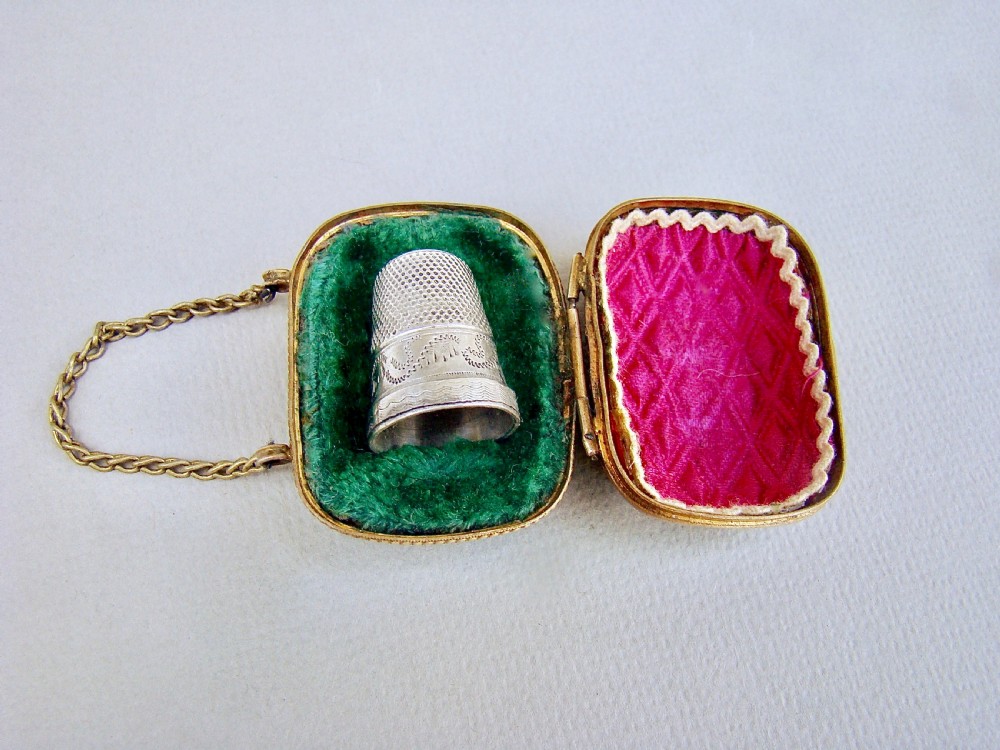EXQUISITE VICTORIAN SILVER THIMBLE IN ORMULU CHATELAINE THIMBLE CASE, CIRCA 1890
