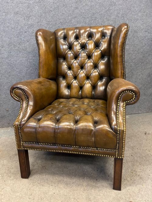 GEORGIAN STYLE WINGED LEATHER ARMCHAIR