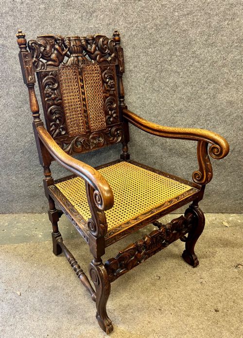 Antique Carved Oak Carolean Style Arm Chair