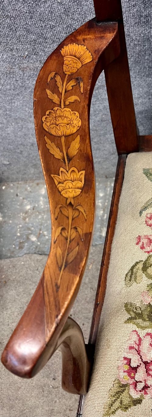An antique mahogany armchair featuring floral marquetry wood inlays throughout the frame and splat, fitted with a floral needlepoint upholstered seat. View VII