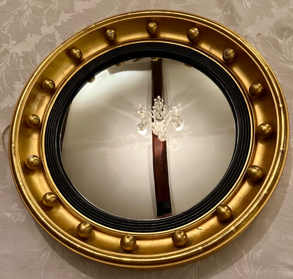 Regency Style Convex and gilded Mirror