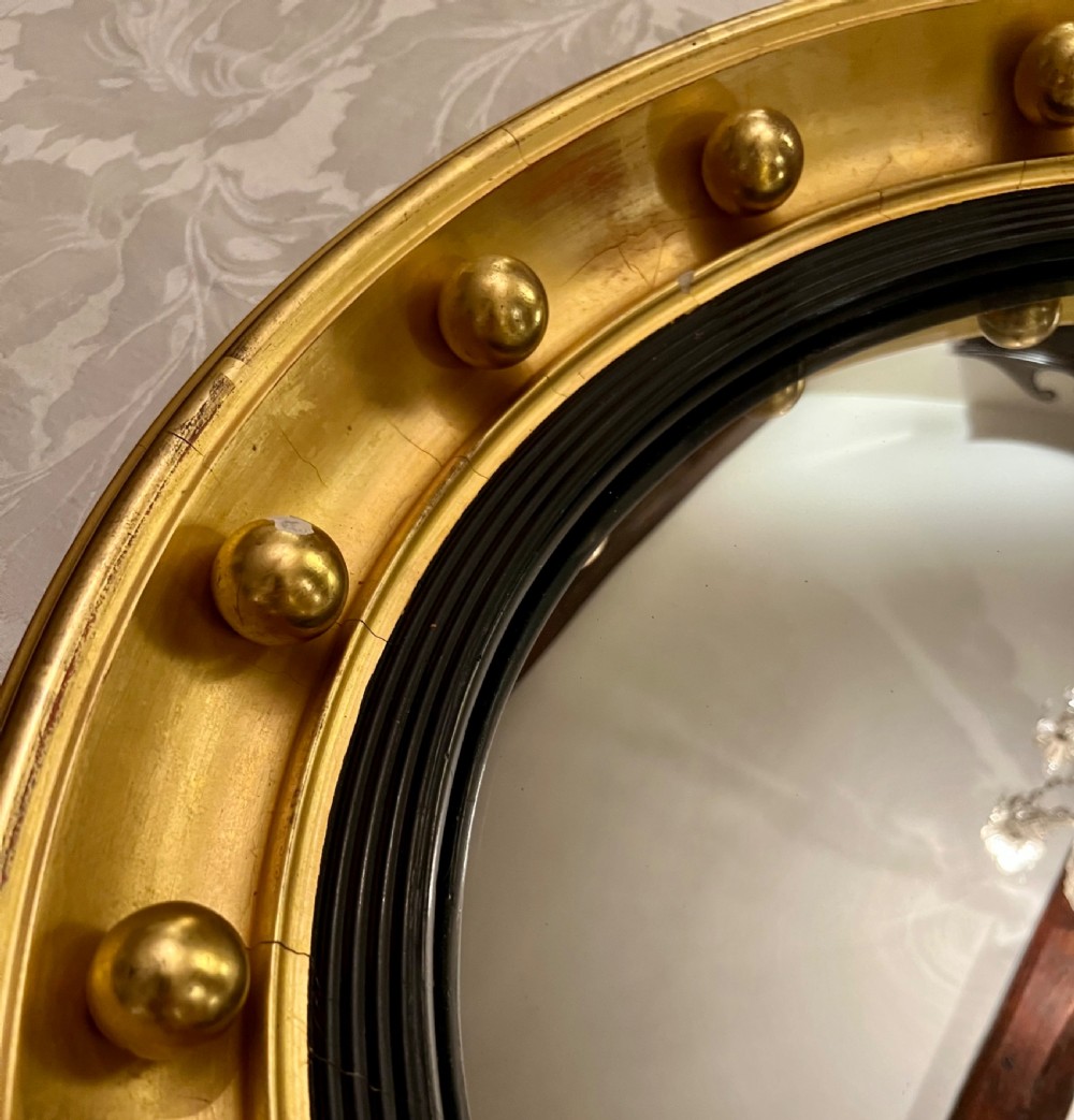 Regency Style Convex and gilded Mirror View IV
