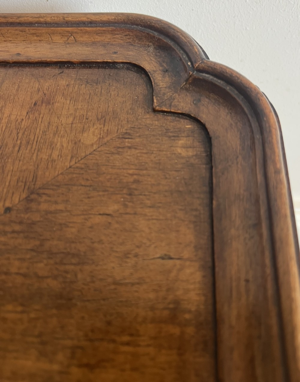 A square walnut Queen Anne style coffee table featuring an inlaid central marquetry medallion, a raised tray rim, and curved cabriole legs ending in pad feet. View VII