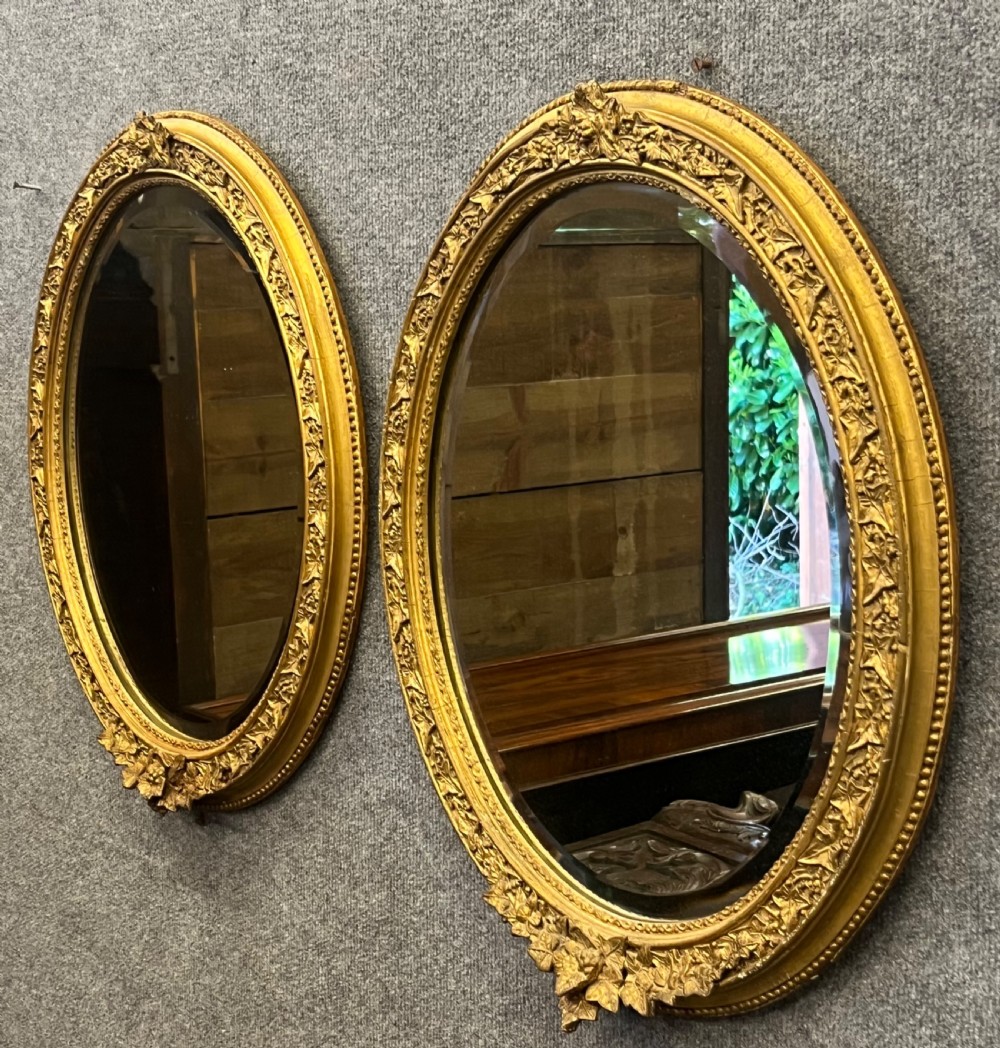 Pair of Antique Oval Mirrors View II
