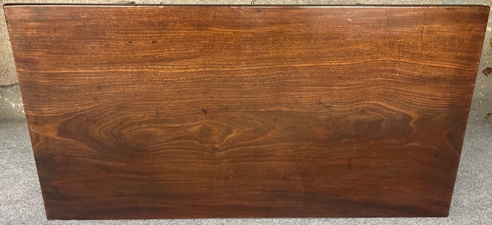 A Georgian dark mahogany fold-over table with straight square legs and a central brass swan-neck handle. View VIII