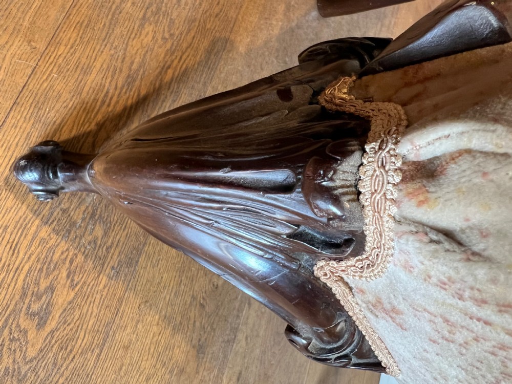 An 18th-century dark mahogany Chippendale armchair featuring a pierced carved back splat, curved arms, floral upholstered seat, and carved cabriole legs. View XII