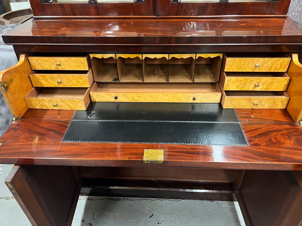 An antique mahogany secretaire bookcase featuring glazed upper doors, a middle drawer with turned knobs, and a double-door lower cabinet. View XII