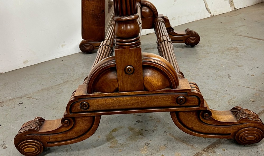 A full-length mahogany cheval dressing mirror featuring fluted upright columns, adjustable brass sconces, and carved scrolled feet. View XVIII