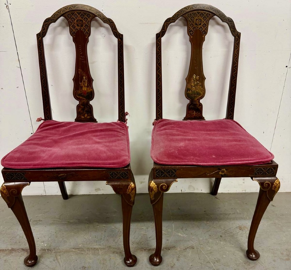 A multi-piece lacquered timber Chinoiserie bedroom suite by Maples and Co, featuring a dressing table with a triple mirror, wardrobes with gilt landscape scenes, and pink velvet upholstered stools. View XII