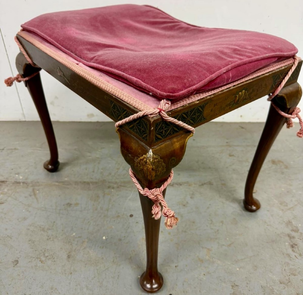 A multi-piece lacquered timber Chinoiserie bedroom suite by Maples and Co, featuring a dressing table with a triple mirror, wardrobes with gilt landscape scenes, and pink velvet upholstered stools. View XIII